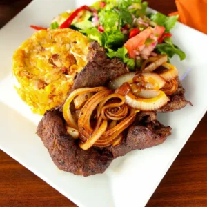Bistec encebollado mofongo
